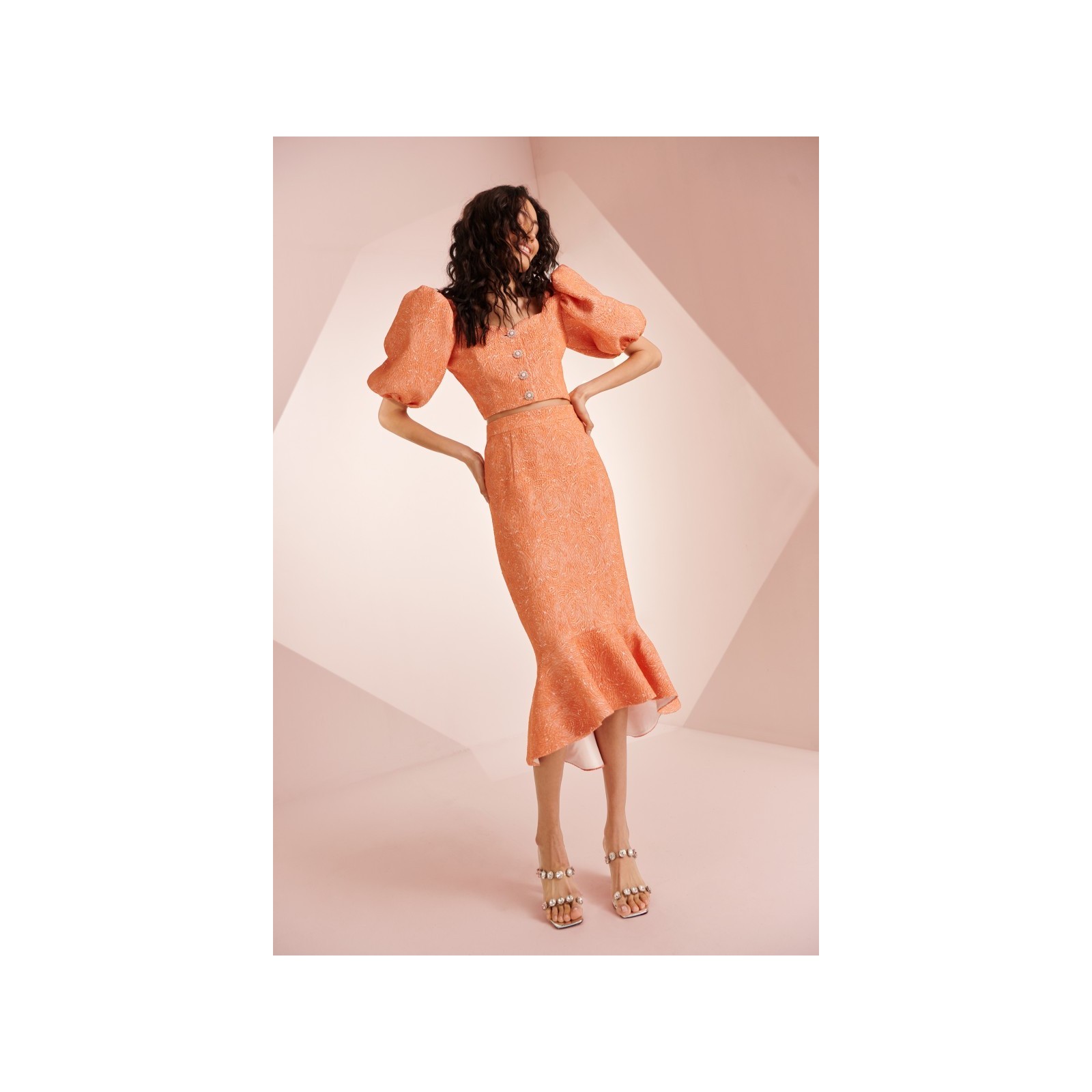Falda con volante en brocado coral Mila