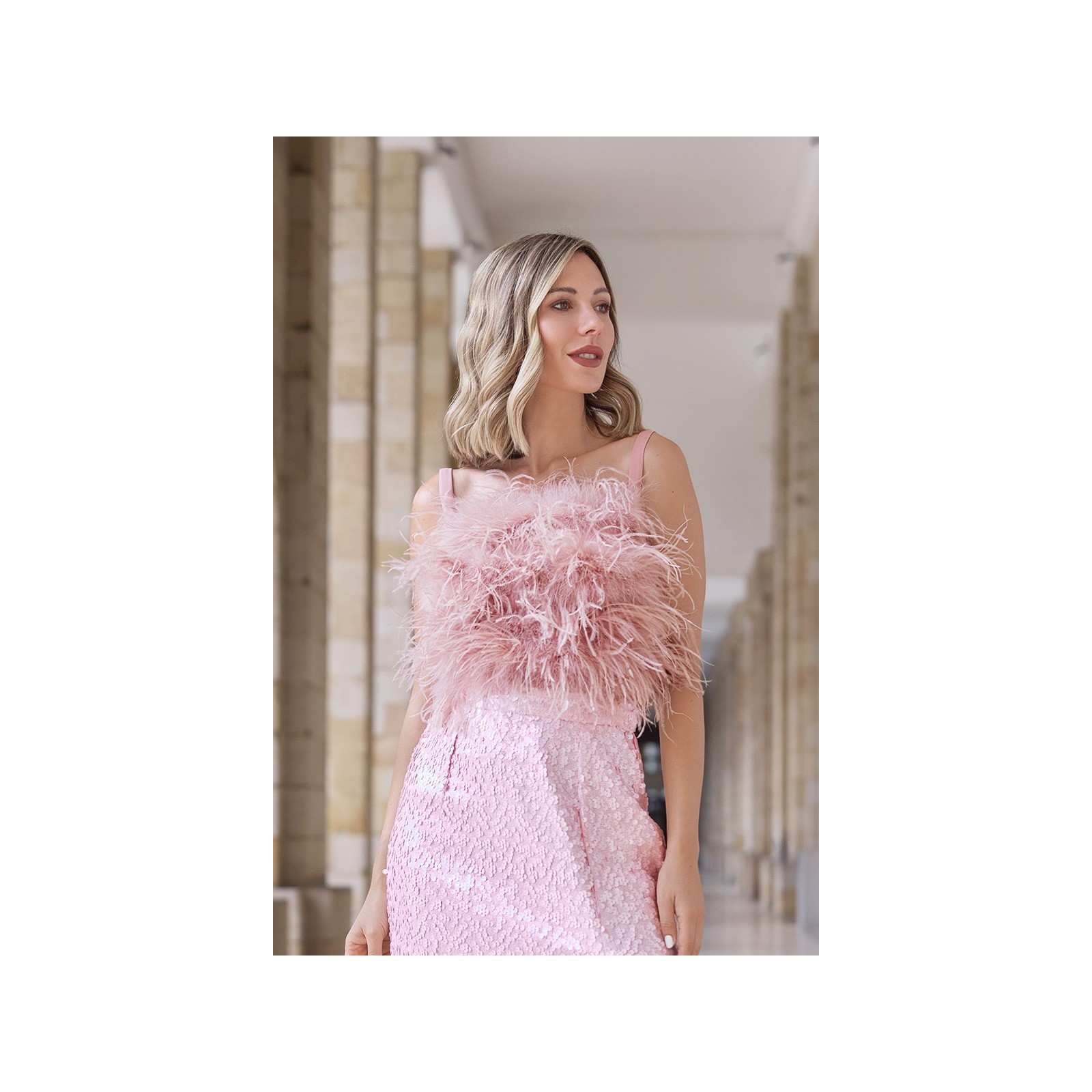Top de plumas en rosa palo