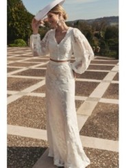 Top en gasa blanca con flores bordadas con manga ablusonada