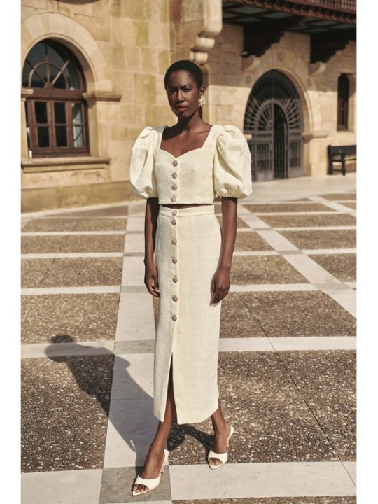 Top manga abullonada joya chanel blanco roto