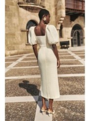 Top manga abullonada joya chanel blanco roto