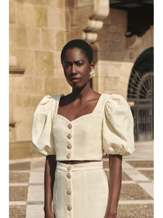 Top manga abullonada joya chanel blanco roto