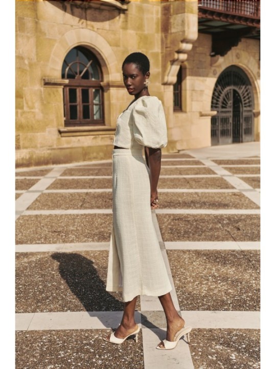 Top manga abullonada joya chanel blanco roto