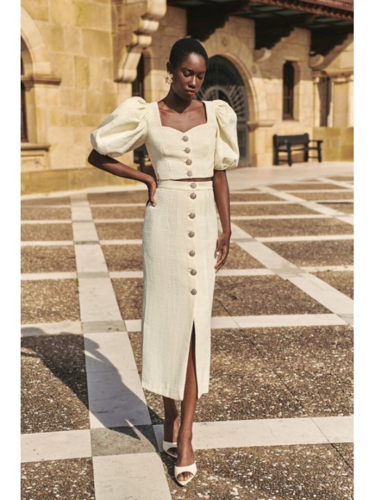 Top manga abullonada joya chanel blanco roto