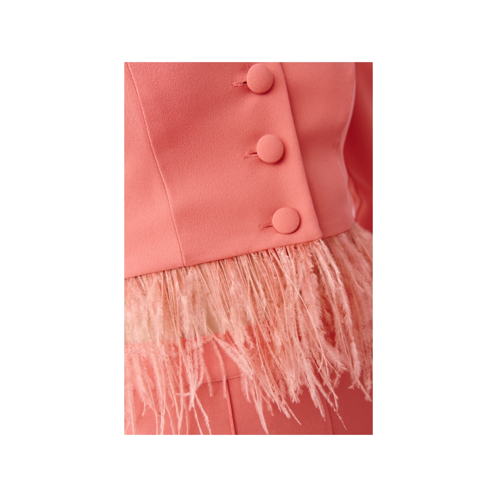 Conjunto de pantalon  y top coral con plumas