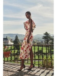 vestido con volantes y falda midi de lino bordado flores para invitadas