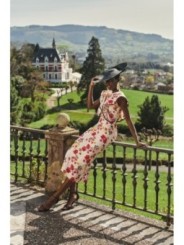 vestido con volantes y falda midi de lino bordado flores para invitadas