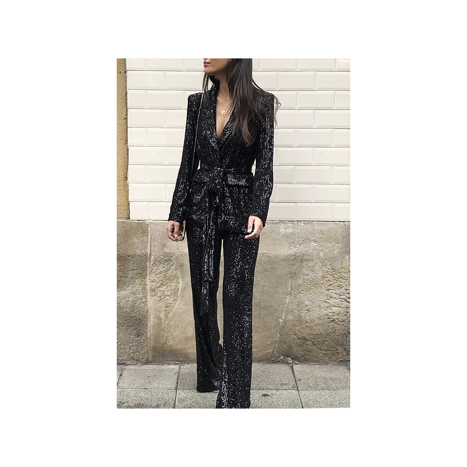 Traje de chaqueta y pantalón negro de lentejuelas