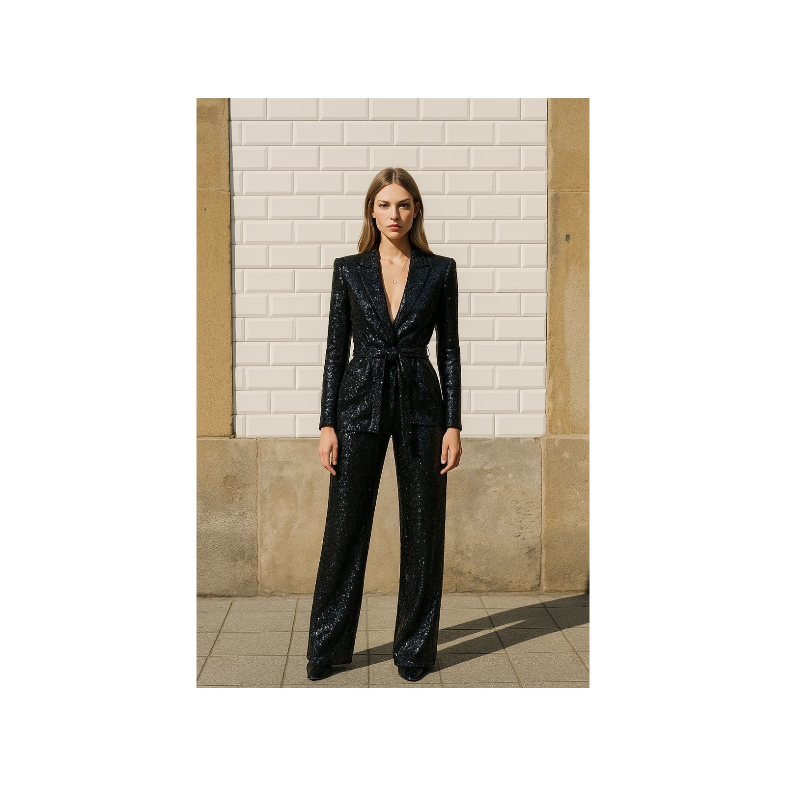 Traje de chaqueta y pantalón negro de lentejuelas