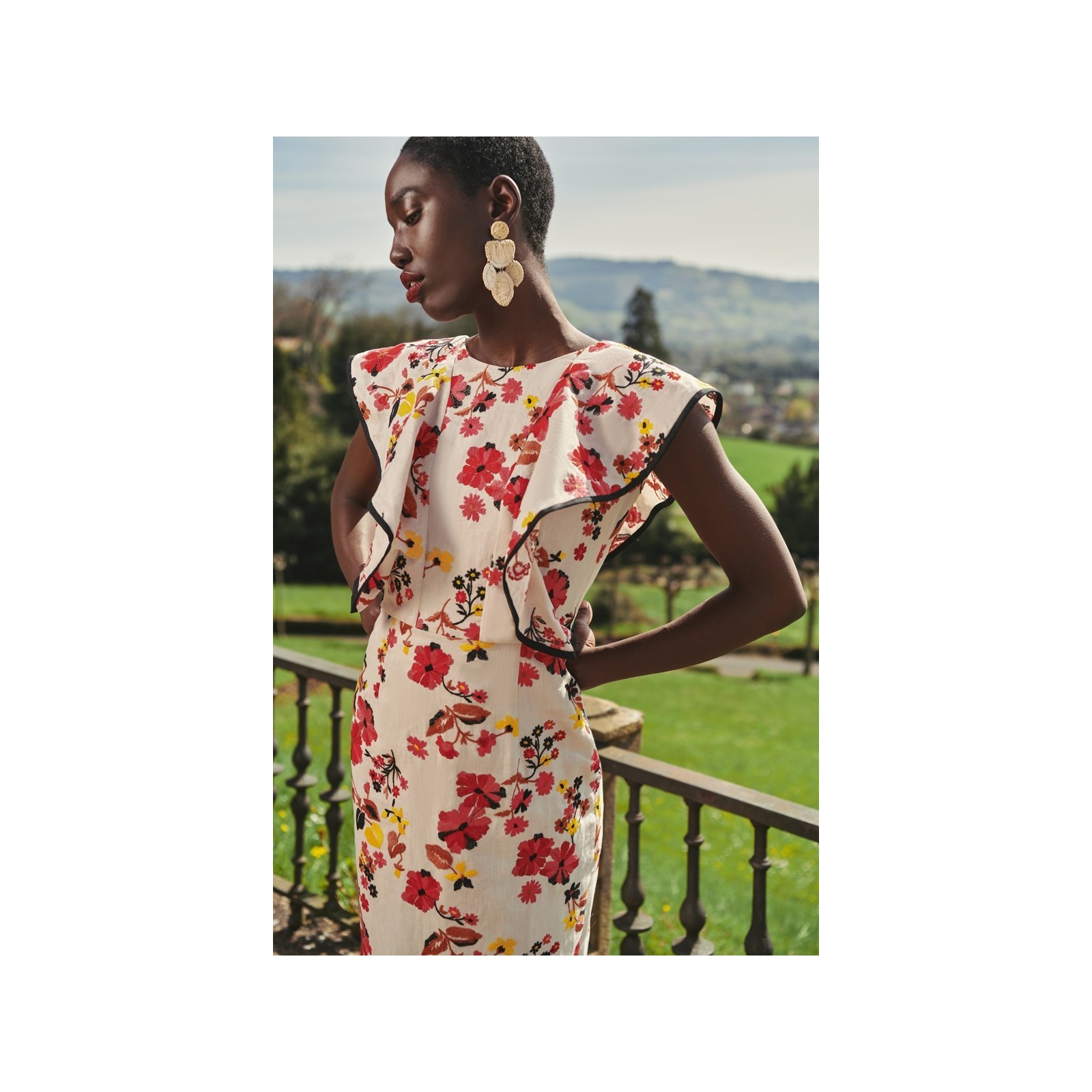 vestido con volantes y falda midi de lino bordado flores para