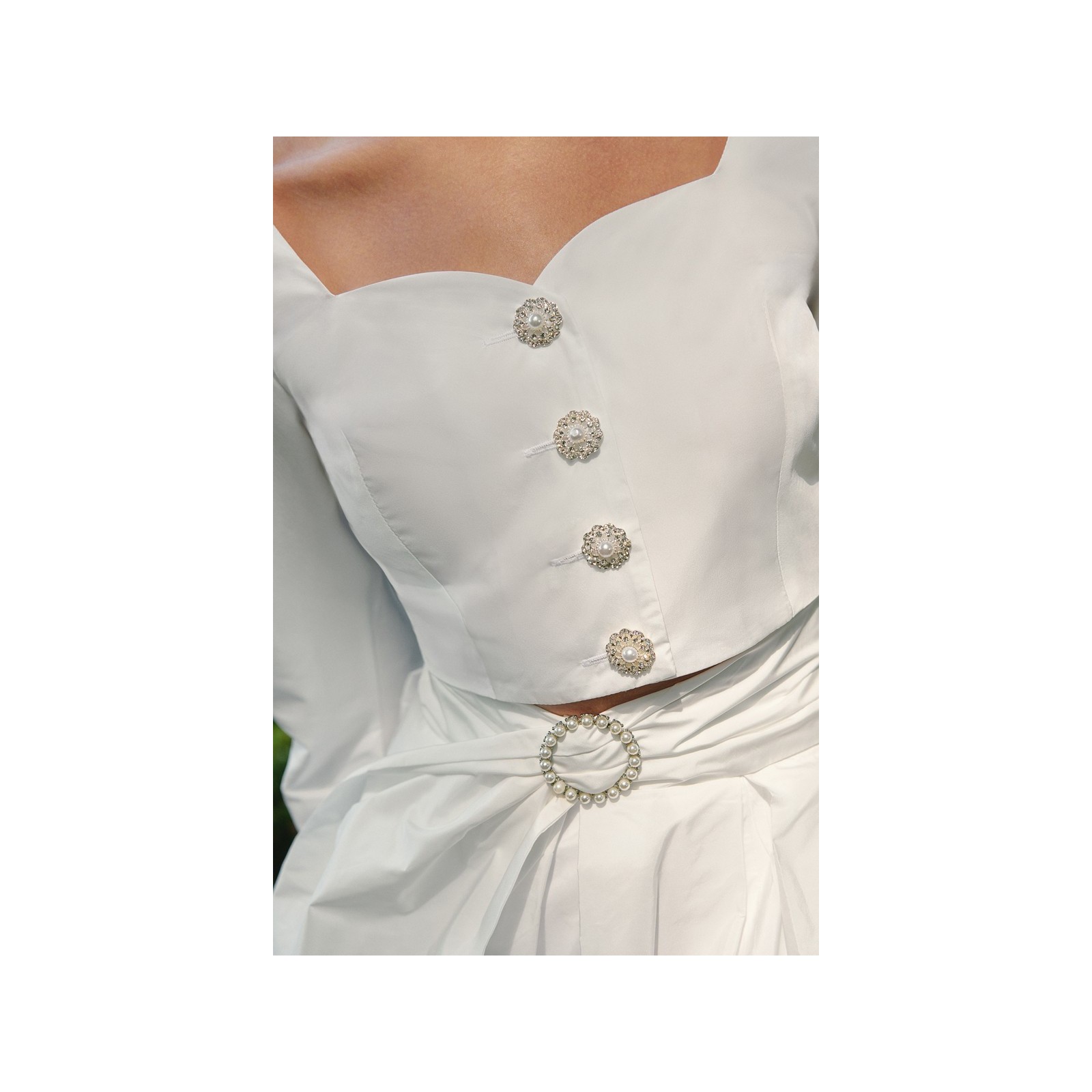 Top joya de tafetan blanco con manga abullonanda