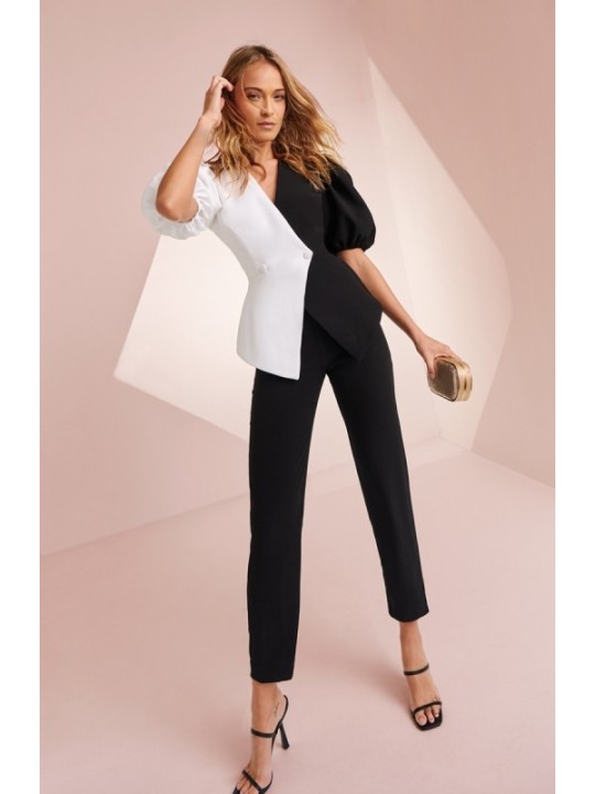 Mono de fiesta de crepe negro y blanco con manga larga abullonada