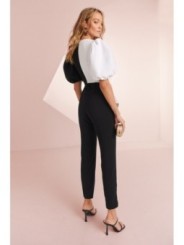 Mono de fiesta de crepe negro y blanco con manga larga abullonada