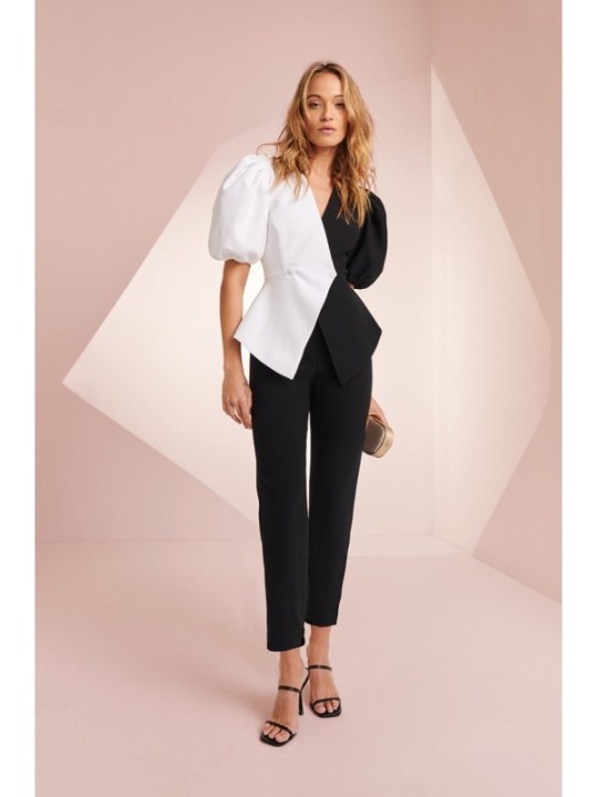 Mono de fiesta de crepe negro y blanco con manga larga abullonada